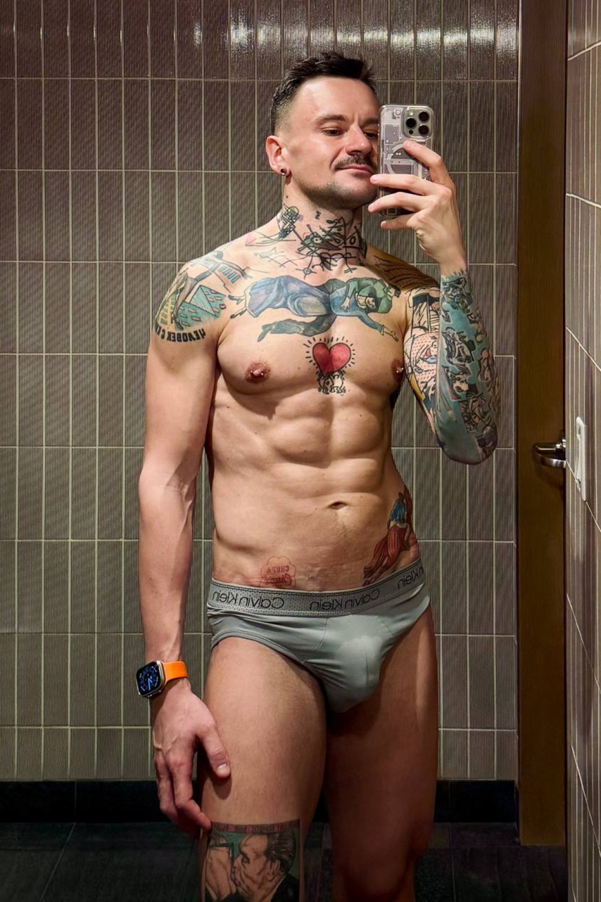 Studio portrait with tattoo detail